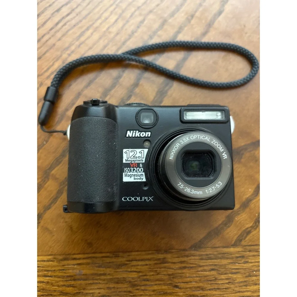 Nikon Coolpix P5100 12.1MP Digital Camera Black 3.5x Optical Zoom VR Magnesium